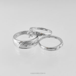 Juego de tres anillos de oro blanco de 14 kilates con piedra zirconia para matrimonio, peso 9.4 Gr Cash y oro