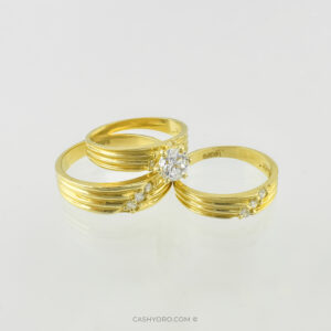 Juego de tres anillos de oro de 14 kilates con piedra de zirconia para matrimonio, peso 9.4 Gr Cash y oro